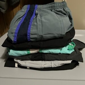 6 pairs of Nike tempo running shorts